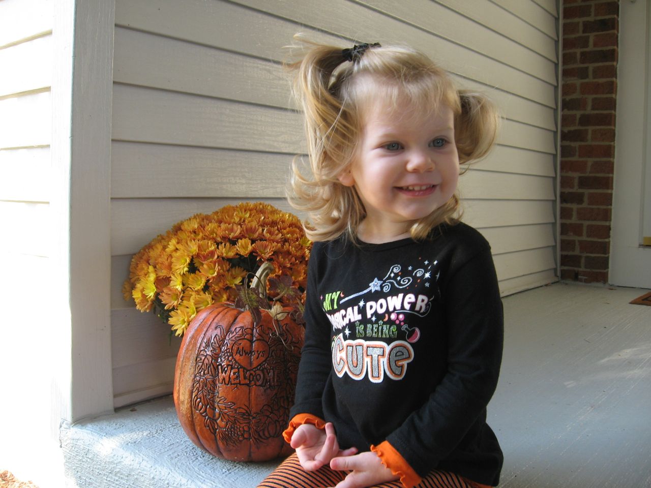Amelia on the Porch Looking Cute